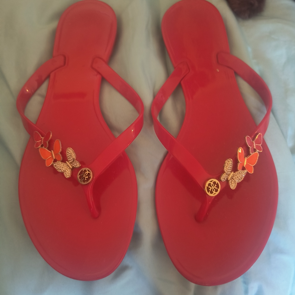 Michael Kors Red Jelly Flip Flop Sandals with Gold Butterfly Accents